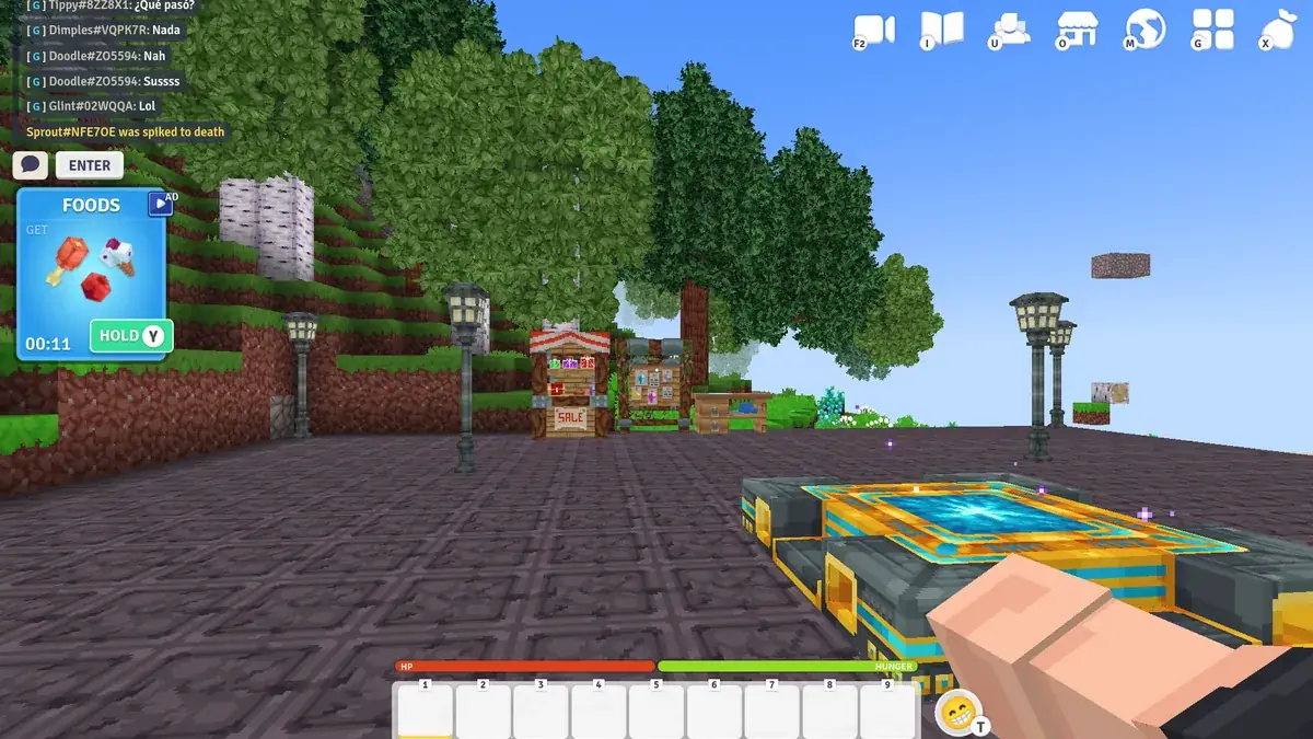 Vectaria.io gameplay: a first-person block hand facing a voxel forest and tower